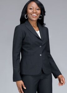 Picture of black woman dressed up in a dark gray or black interview pants suit.